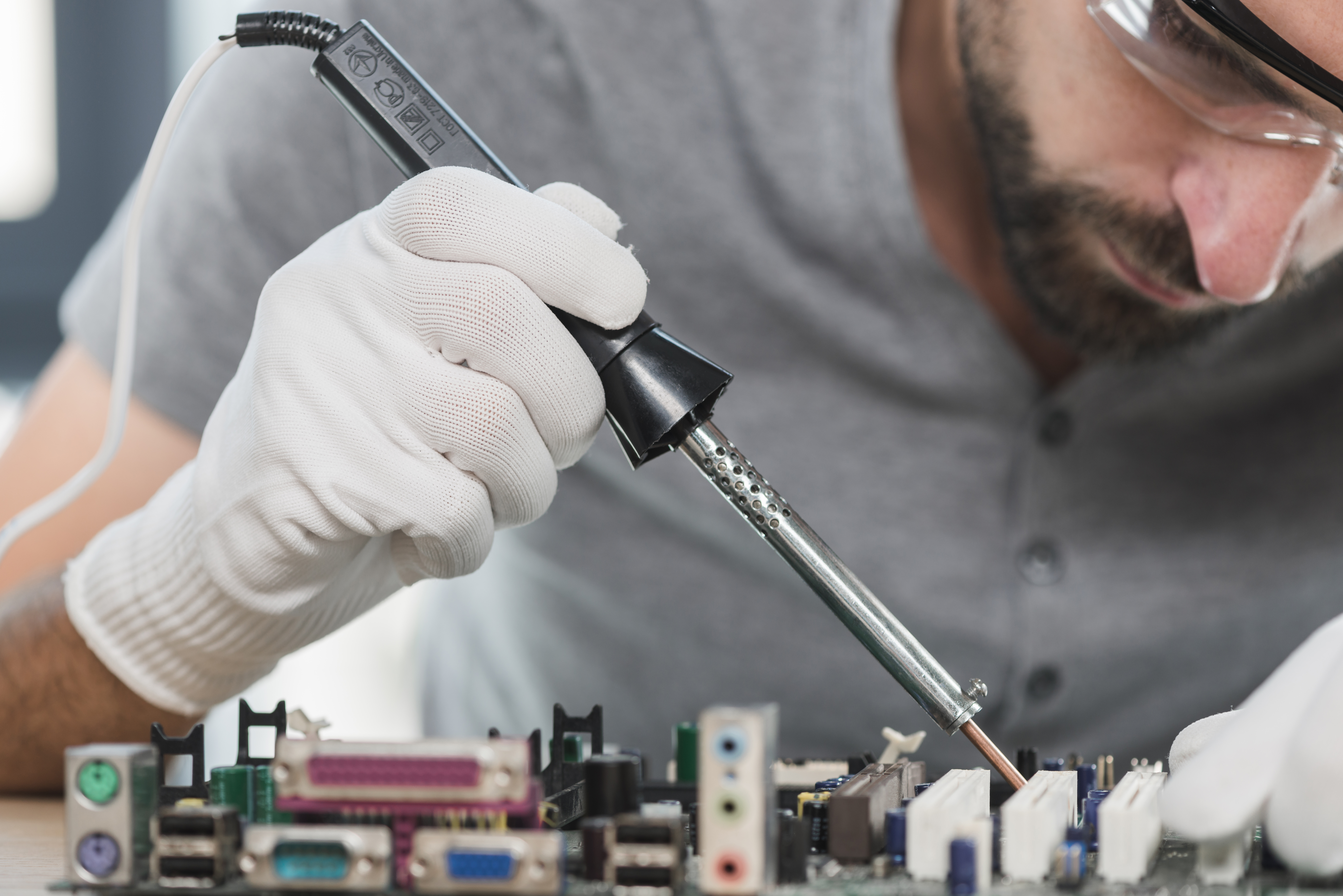 Technician working on electrical circuit